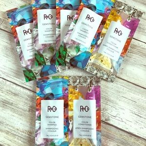 R & Co shampoo and conditioner travel packs.